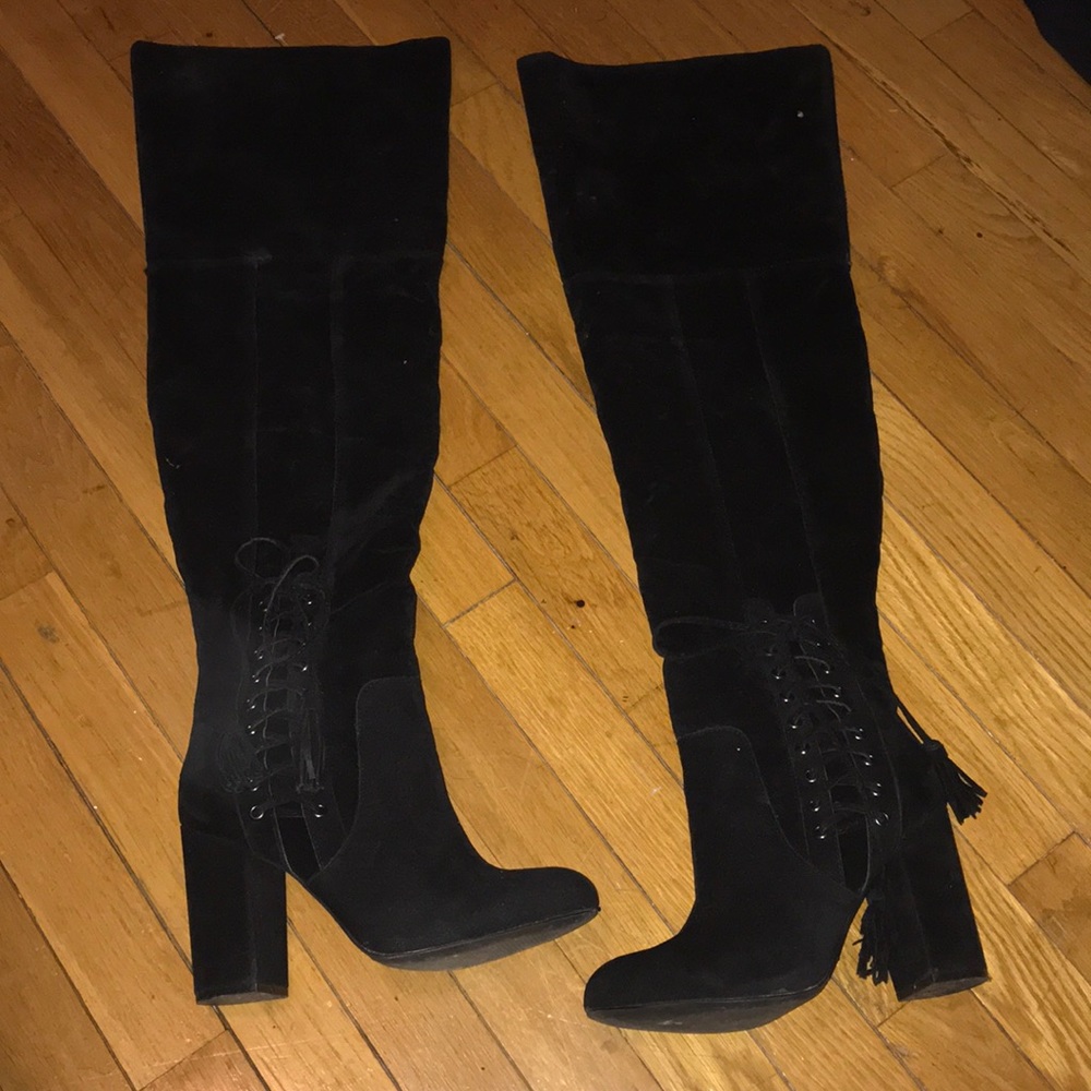 Shoe dazzle thigh high boots.